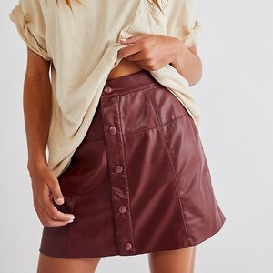 Never worn with tags Free People vegan black leather skirt